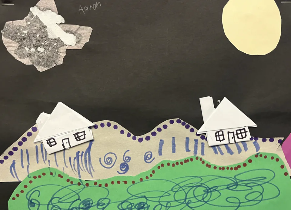A paper collage landscape with cut mountains, a folded origami house and a pale moon above a dark ground.